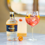 THE PINK AMIS * 50ml GINAMIS * 100ml Pink Tonic  Fill a glass with ice cubes. That’s right, to the rim. Pour in 50ml GINAMIS then gently add 100ml of Pink Tonic. Give it a slow stir before garnishing with a slice of orange and a couple of dried juniper. 